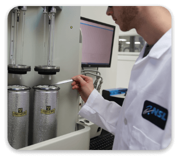 A person in a lab using a pipette